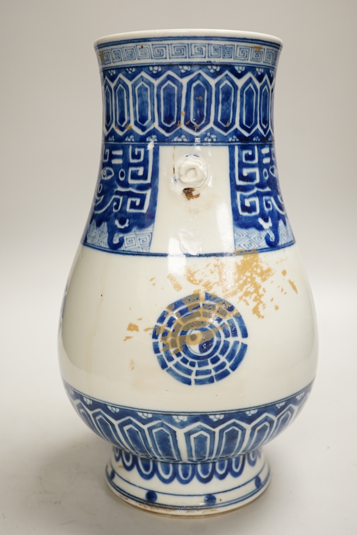 A Chinese blue and white vase. 32cm tall